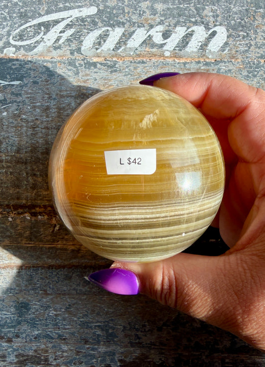 Gorgeous Yellow/Purple Silky Banded Fluorite Sphere | Opt L