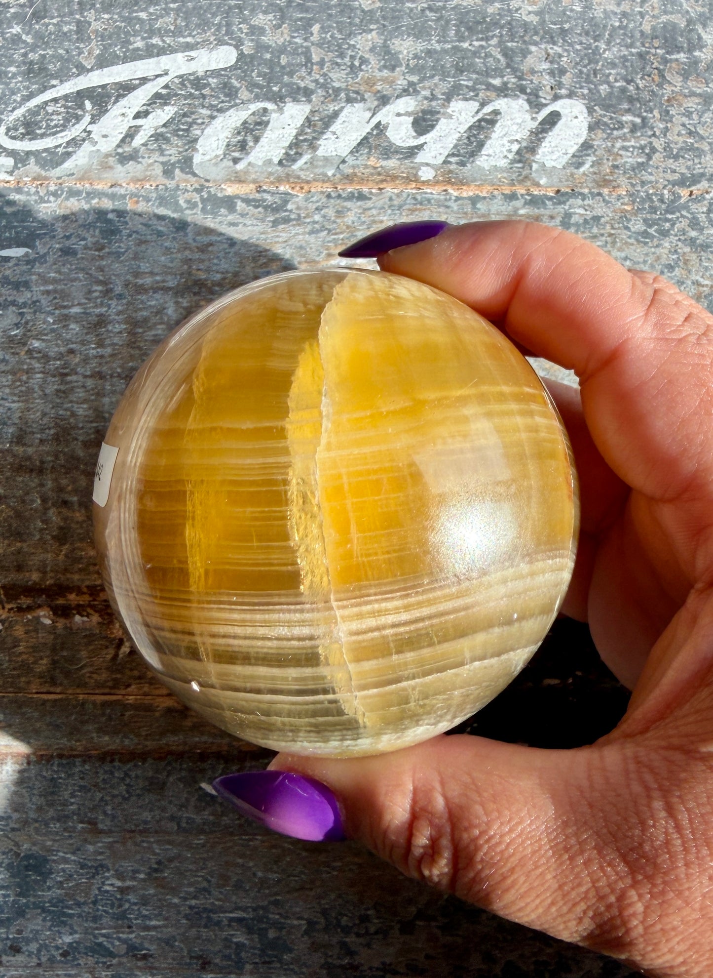 Gorgeous Yellow/Purple Silky Banded Fluorite Sphere | Opt L