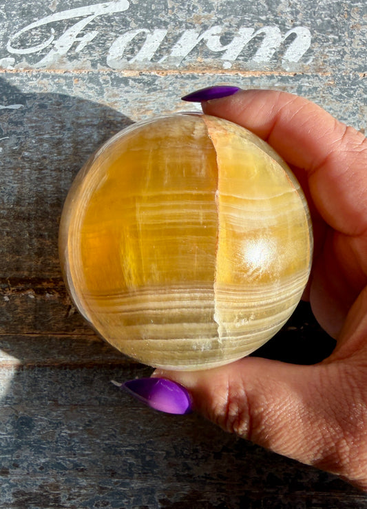 Gorgeous Yellow/Purple Silky Banded Fluorite Sphere | Opt L