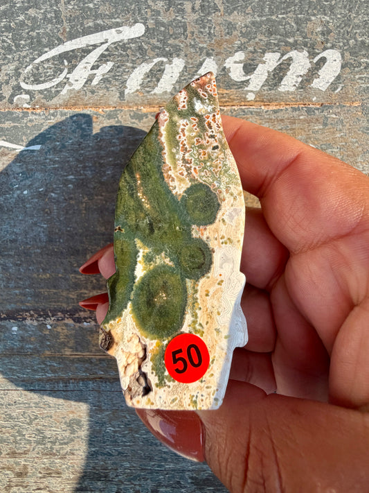 Gorgeous Ocean Jasper Hand Carved Skull w/ Feather | Opt 50
