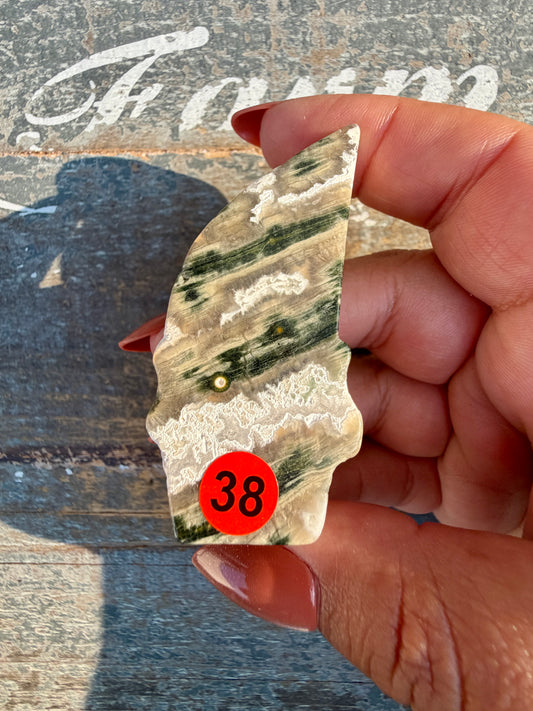 Gorgeous Ocean Jasper Hand Carved Skull w/ Feather | Opt 38