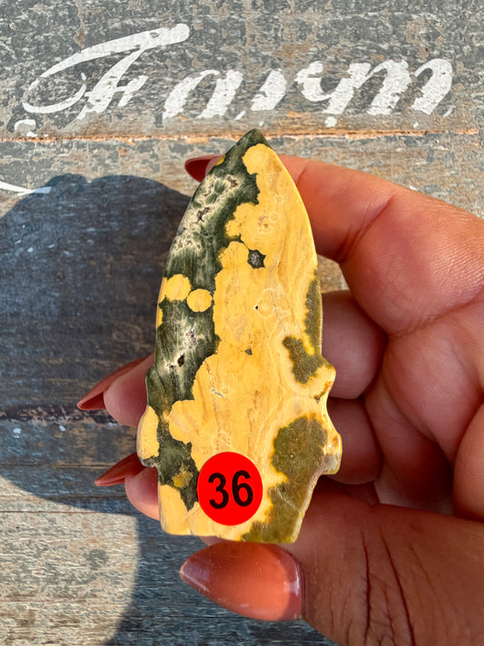 Gorgeous Ocean Jasper Hand Carved Skull w/ Feather | Opt 36