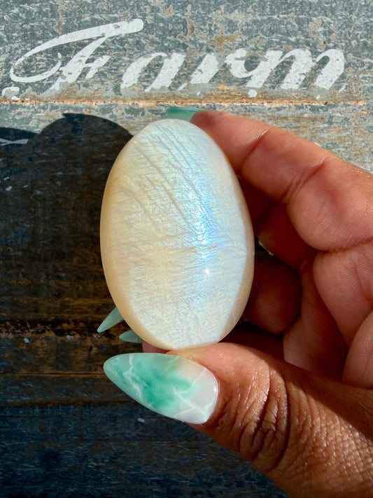 Gorgeous Blue Flash White Moonstone Palm Stone | India | Opt N