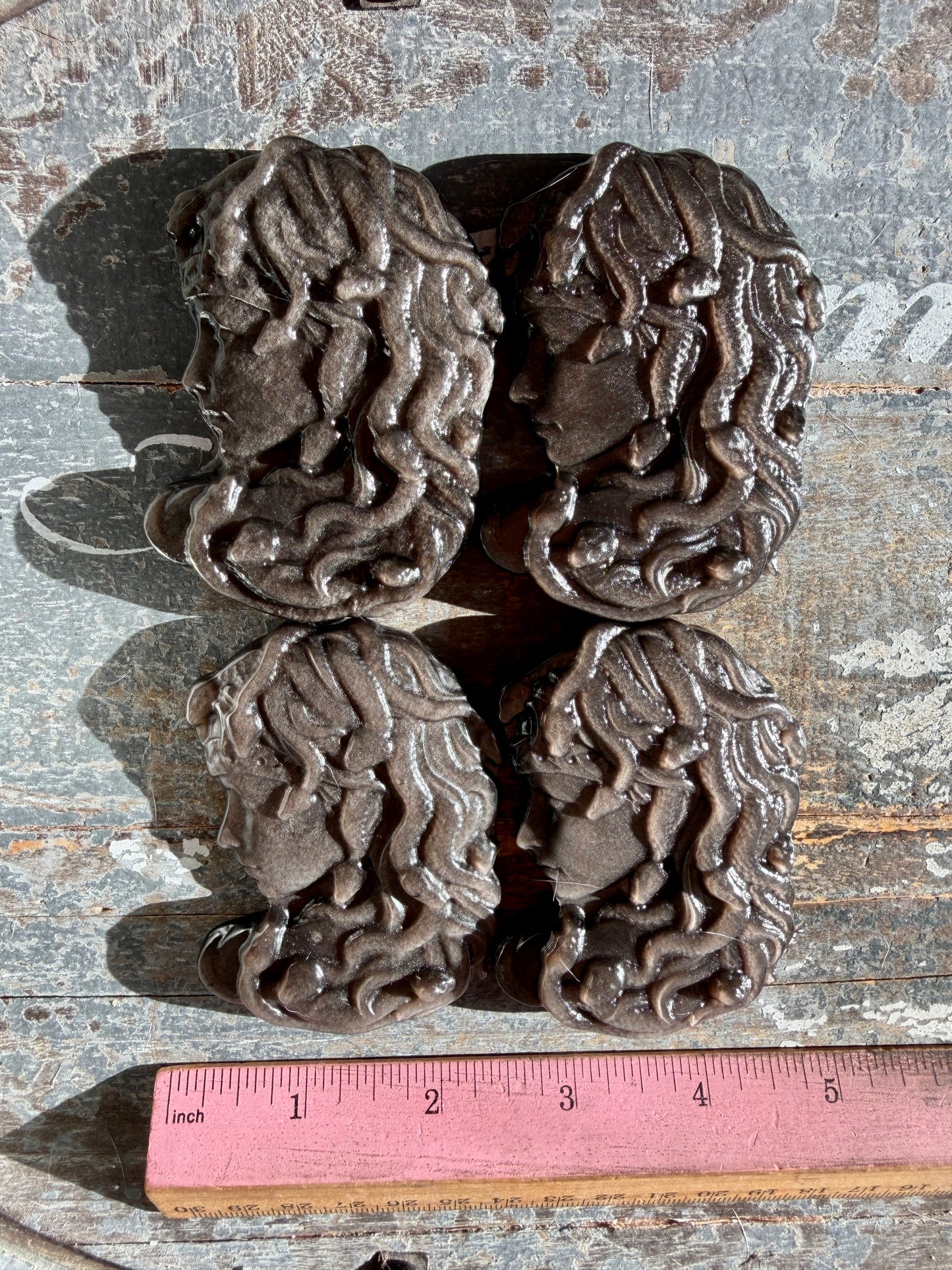 One (1) Silver Sheen Obsidian Medusa