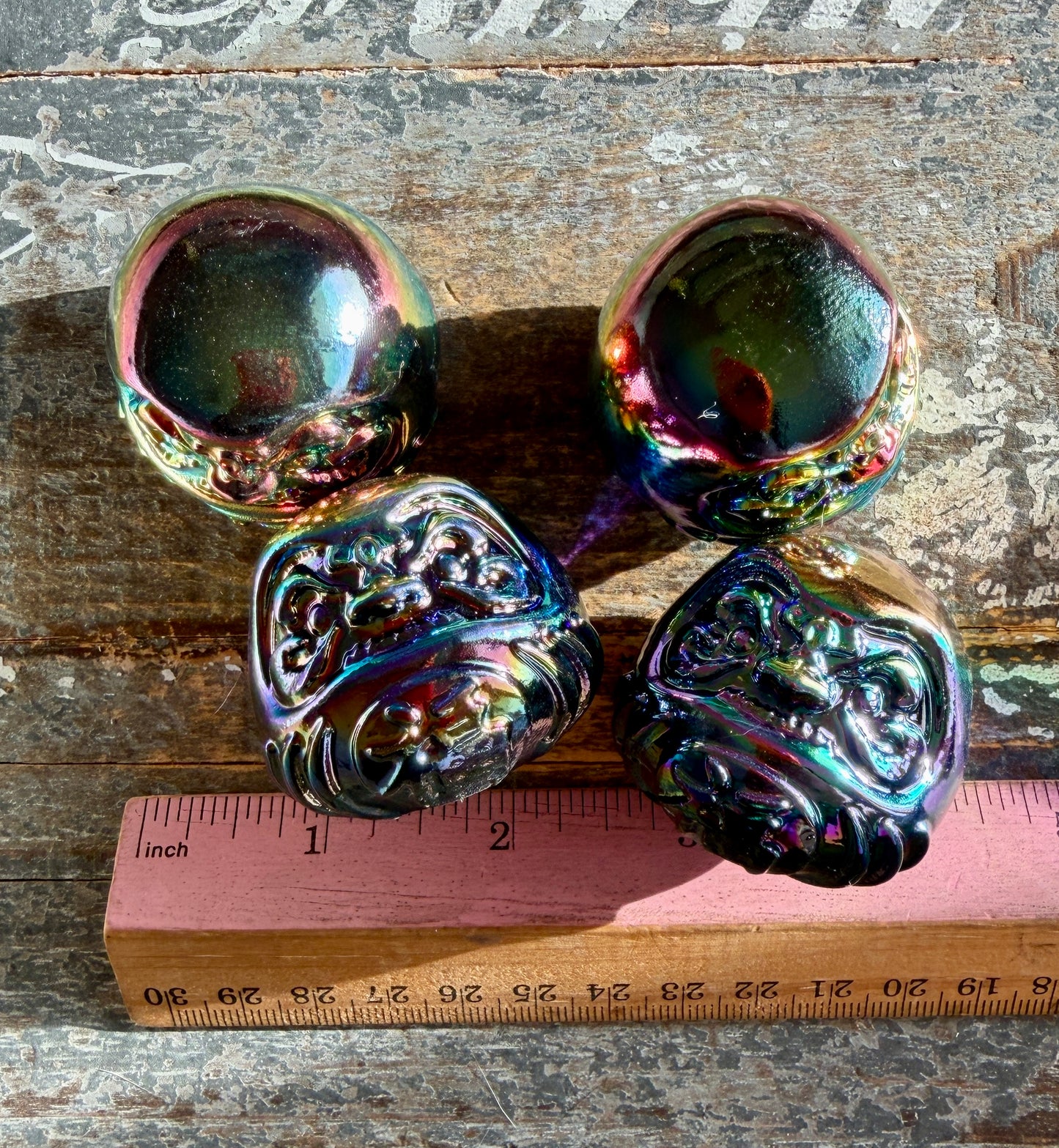 One (1) Titanium Aura Daruma doll (smaller)