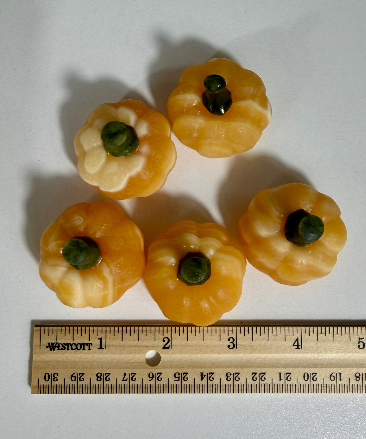 One (1) Mini Orange Calcite Pumpkin (Serpentine Stem)