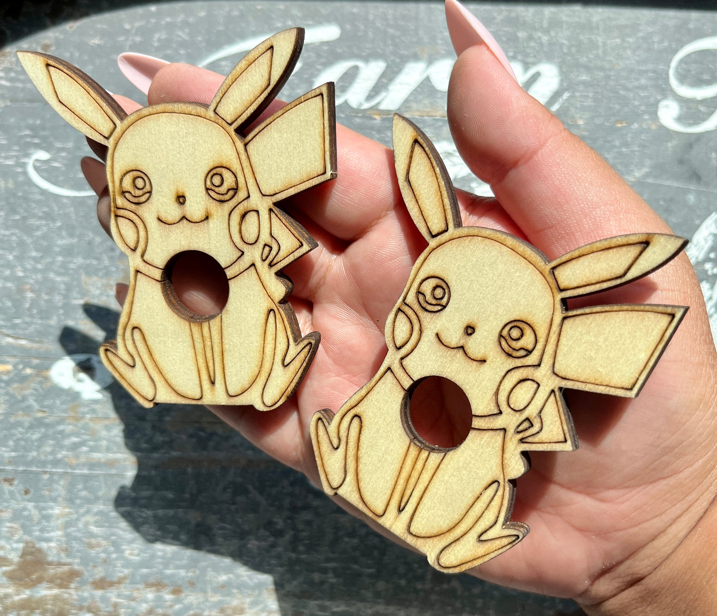 One (1) Pikachu Wood Sphere Stand