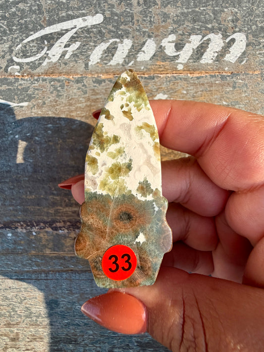 Gorgeous Ocean Jasper Hand Carved Skull w/ Feather | Opt 33