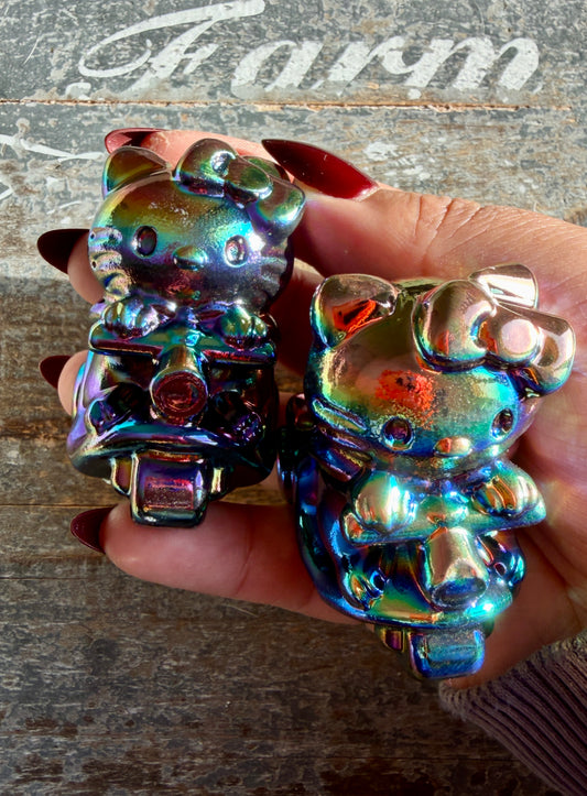 One (1) Titanium Aura Hello Kitty Scooter