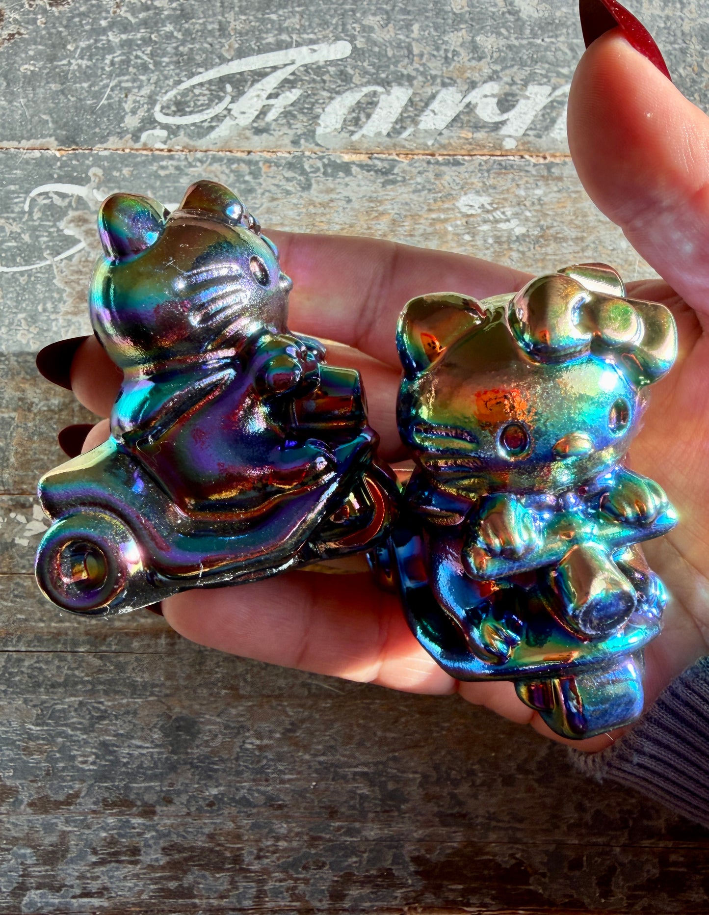 One (1) Titanium Aura Hello Kitty Scooter