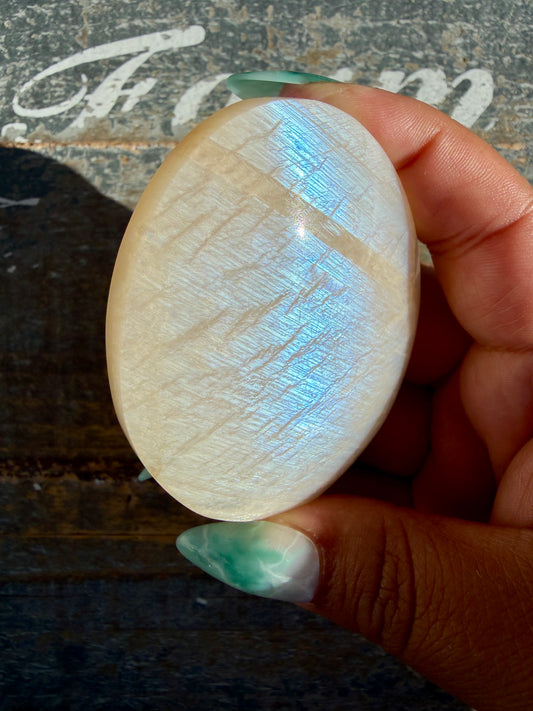 Gorgeous Blue Flash White Moonstone Palm Stone | India | Opt I