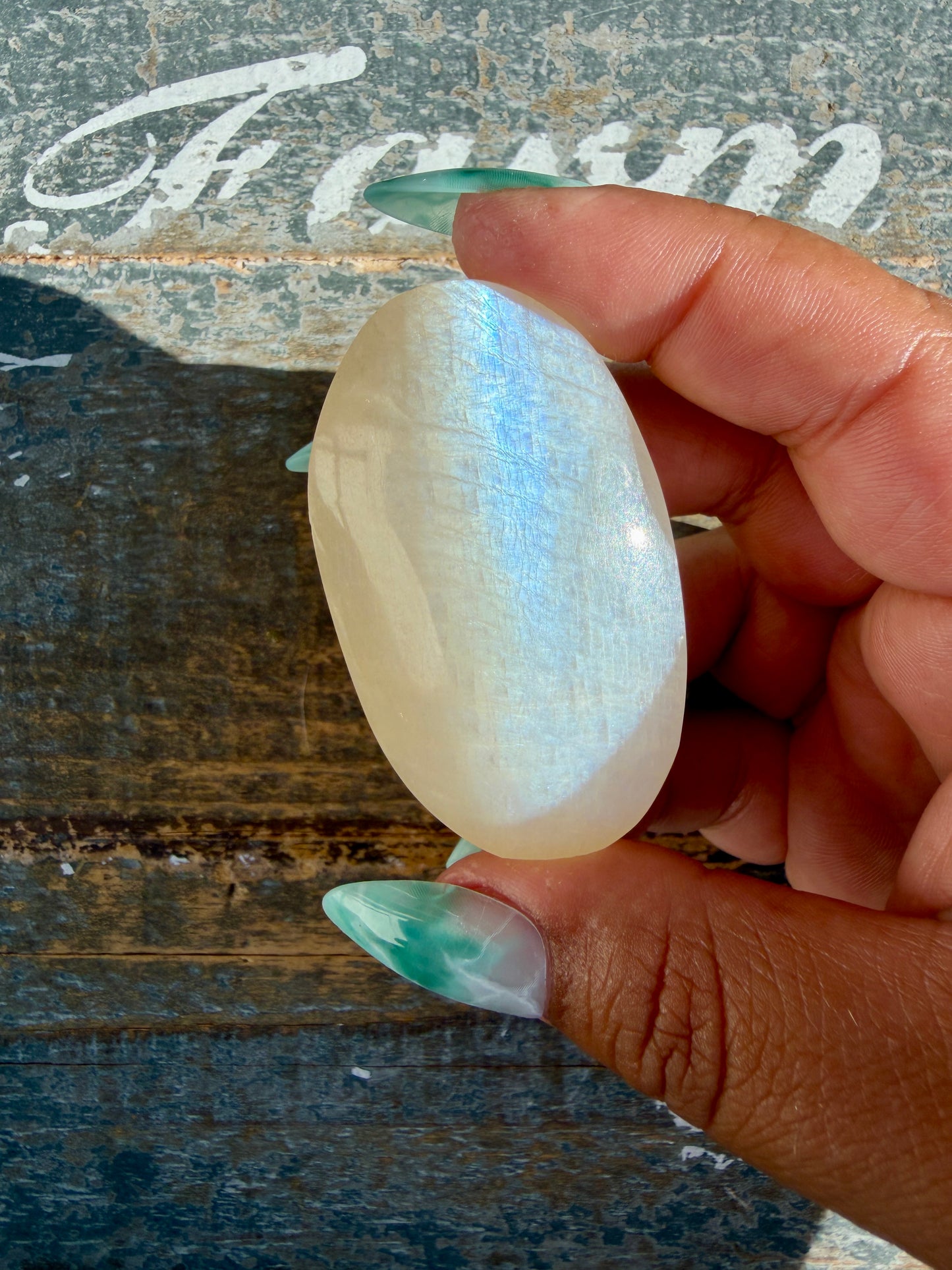 Gorgeous Blue Flash White Moonstone Palm Stone | India | Opt C