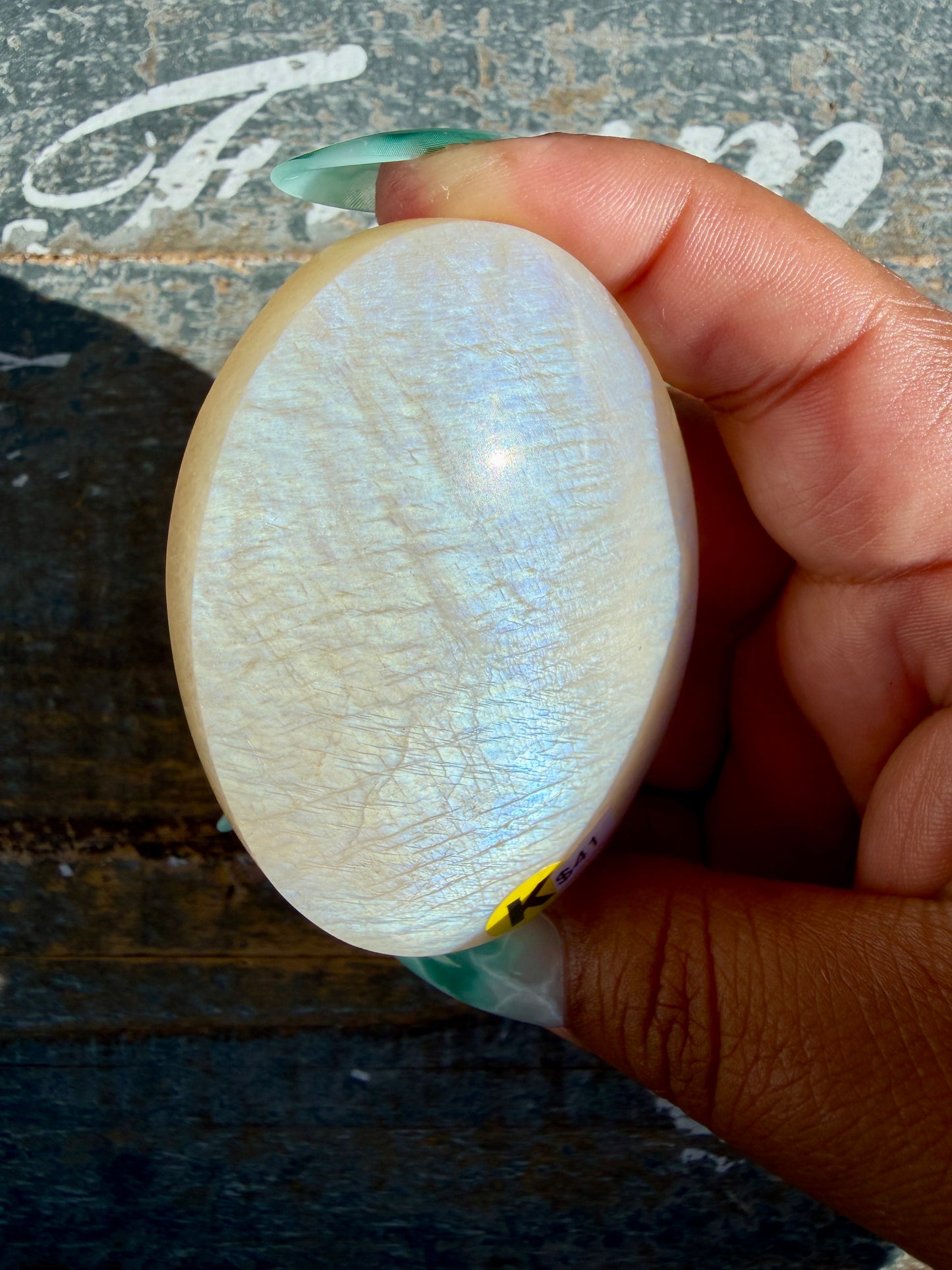 Gorgeous Blue Flash White Moonstone Palm Stone | India | Opt K
