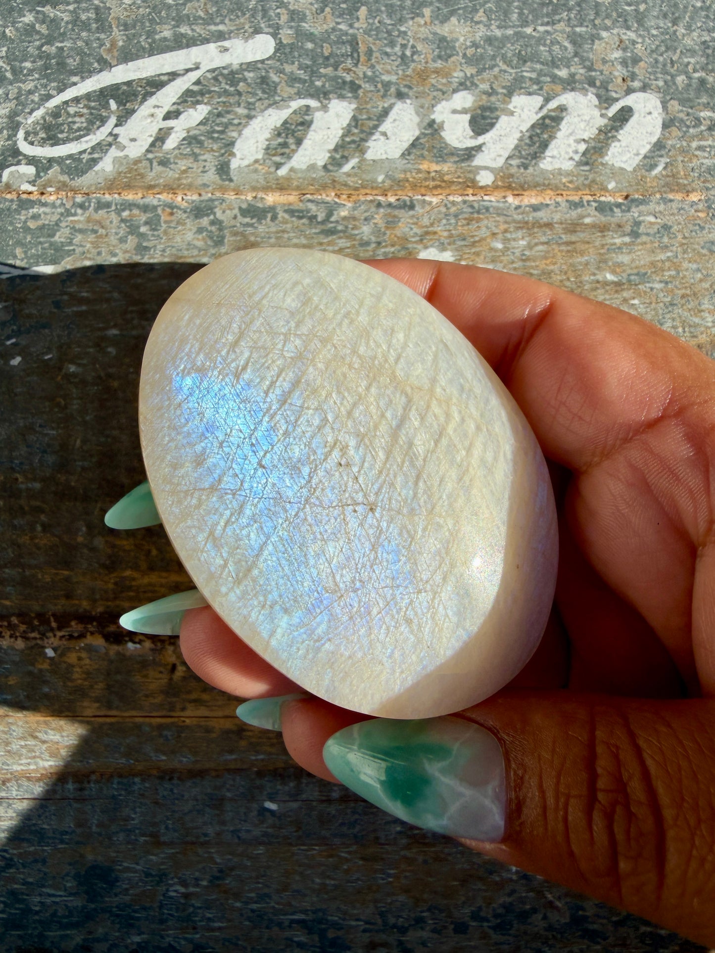 Gorgeous Blue Flash White Moonstone Palm Stone | India | Opt K