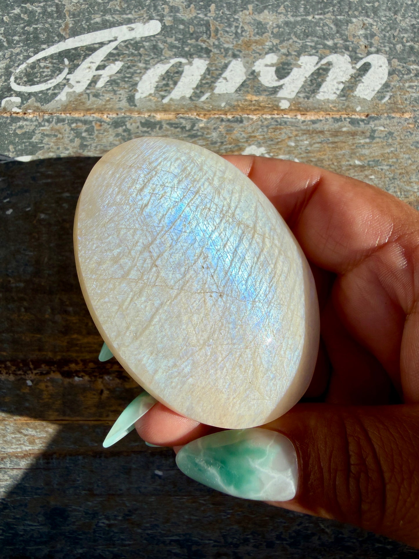 Gorgeous Blue Flash White Moonstone Palm Stone | India | Opt K