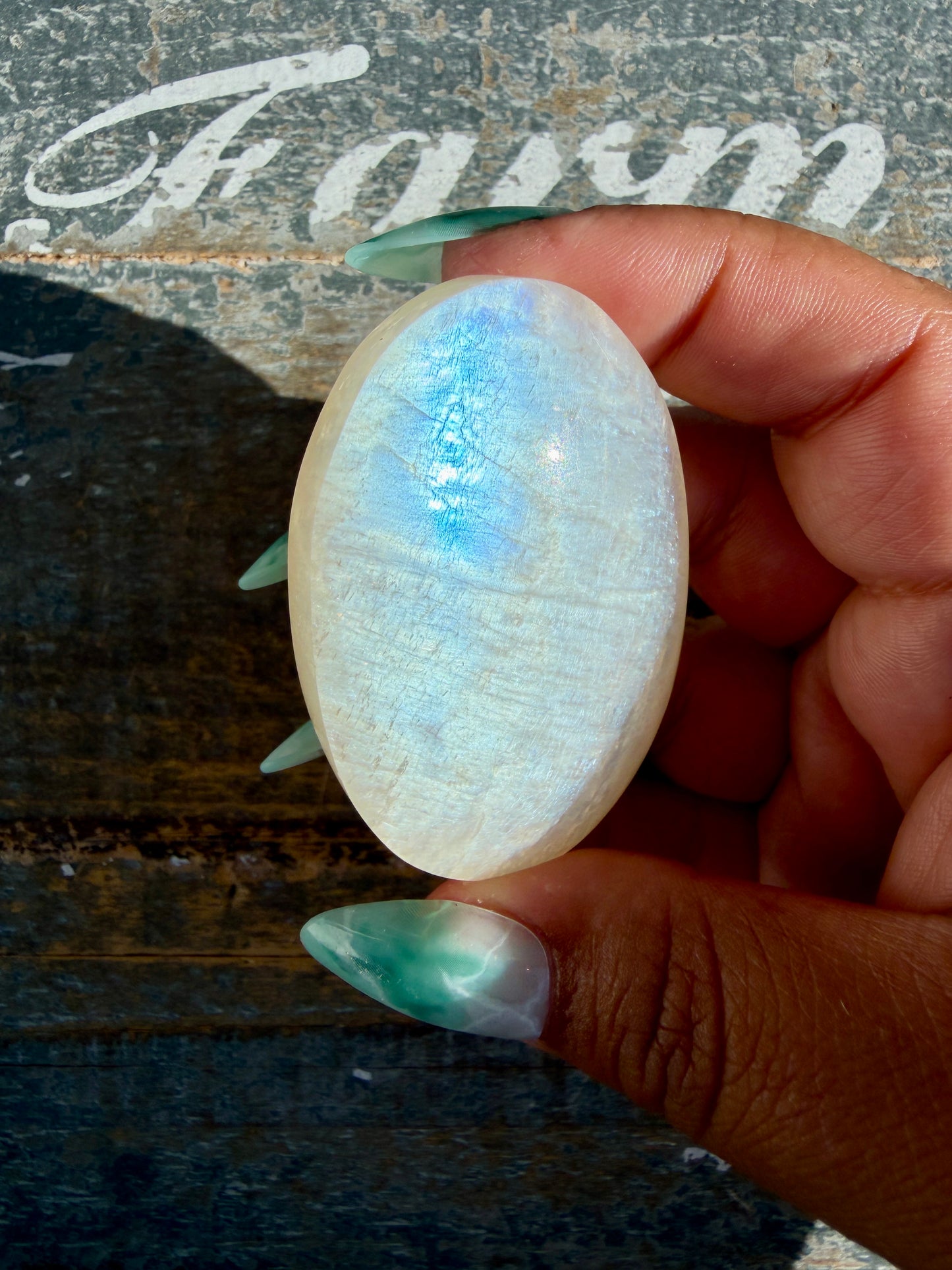 Gorgeous Blue Flash White Moonstone Palm Stone | India | Opt B