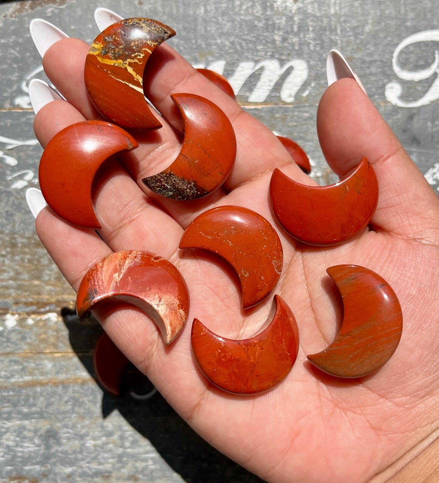 One (1) Red Jasper Half Moon