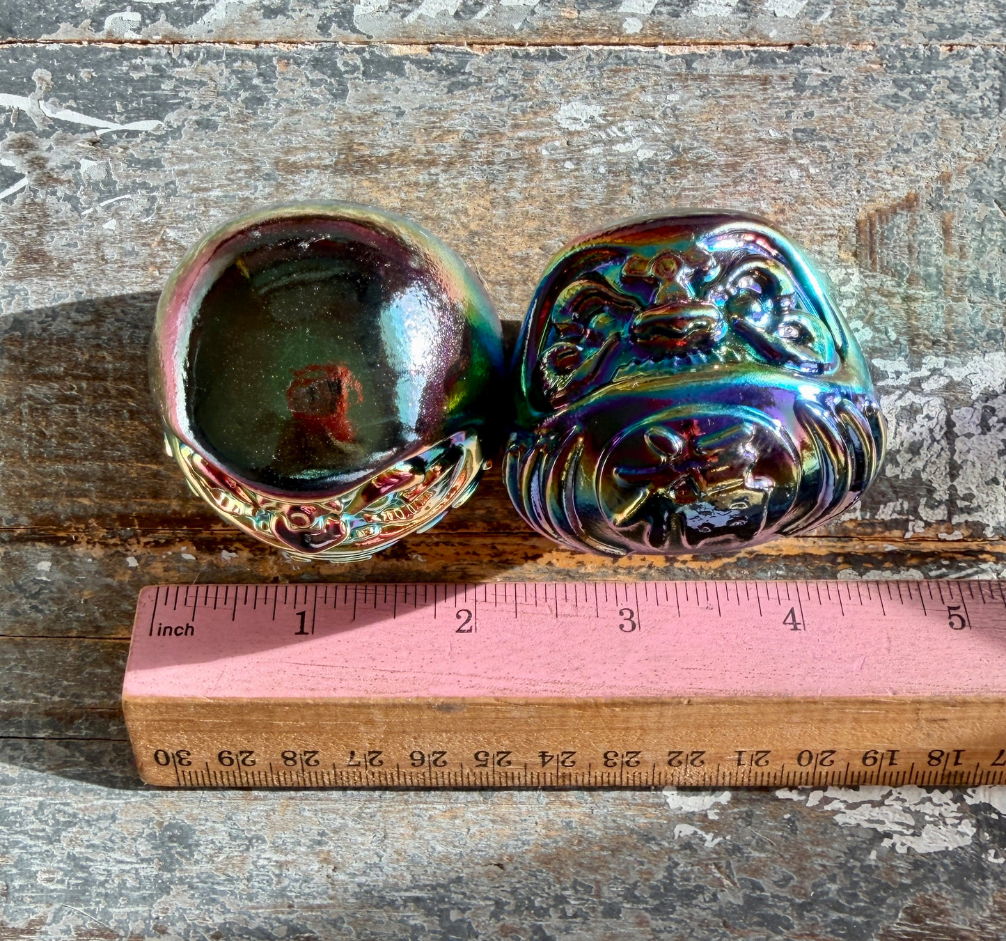 One (1) Titanium Aura Daruma doll (bigger)