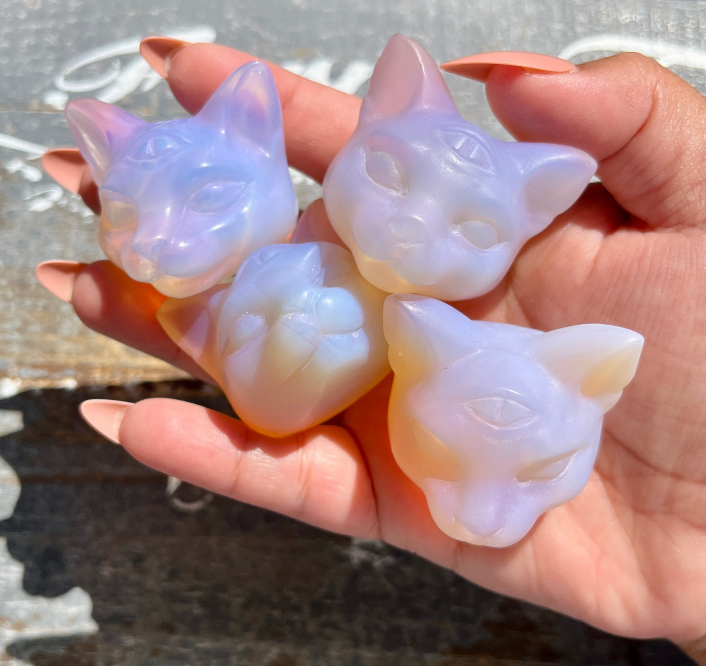 One (1) Pink Opalite Cat Head Carving *man made*