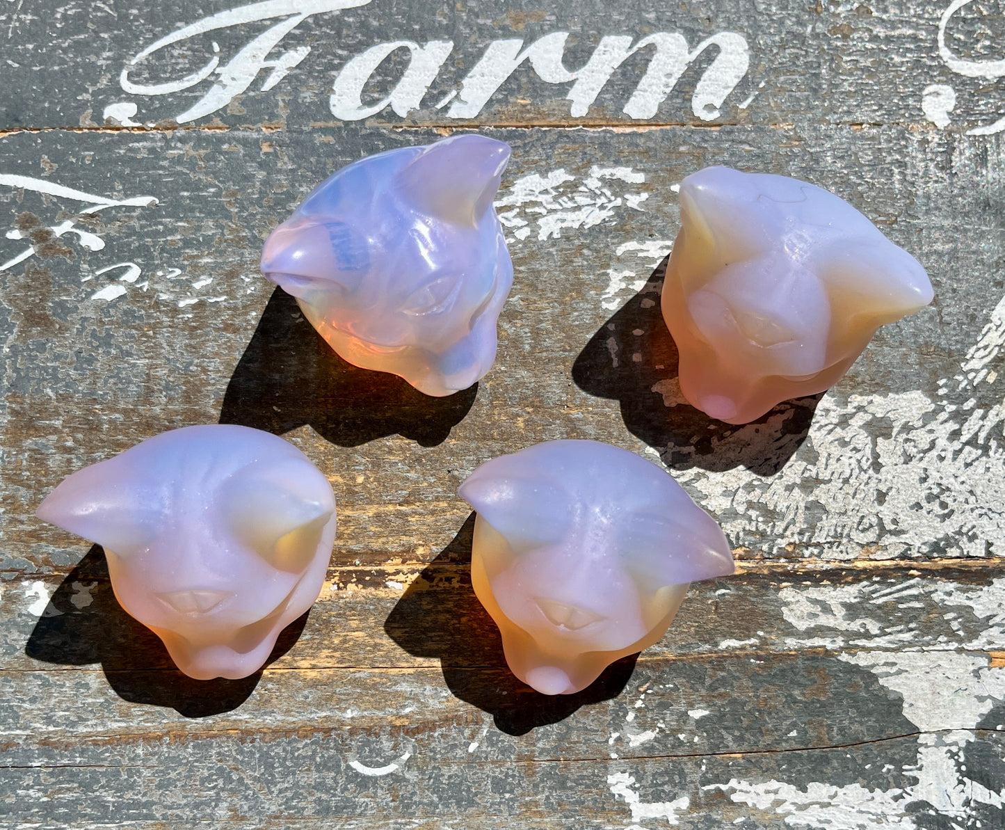 One (1) Pink Opalite Cat Head Carving *man made*