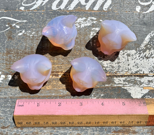 One (1) Pink Opalite Cat Head Carving *man made*