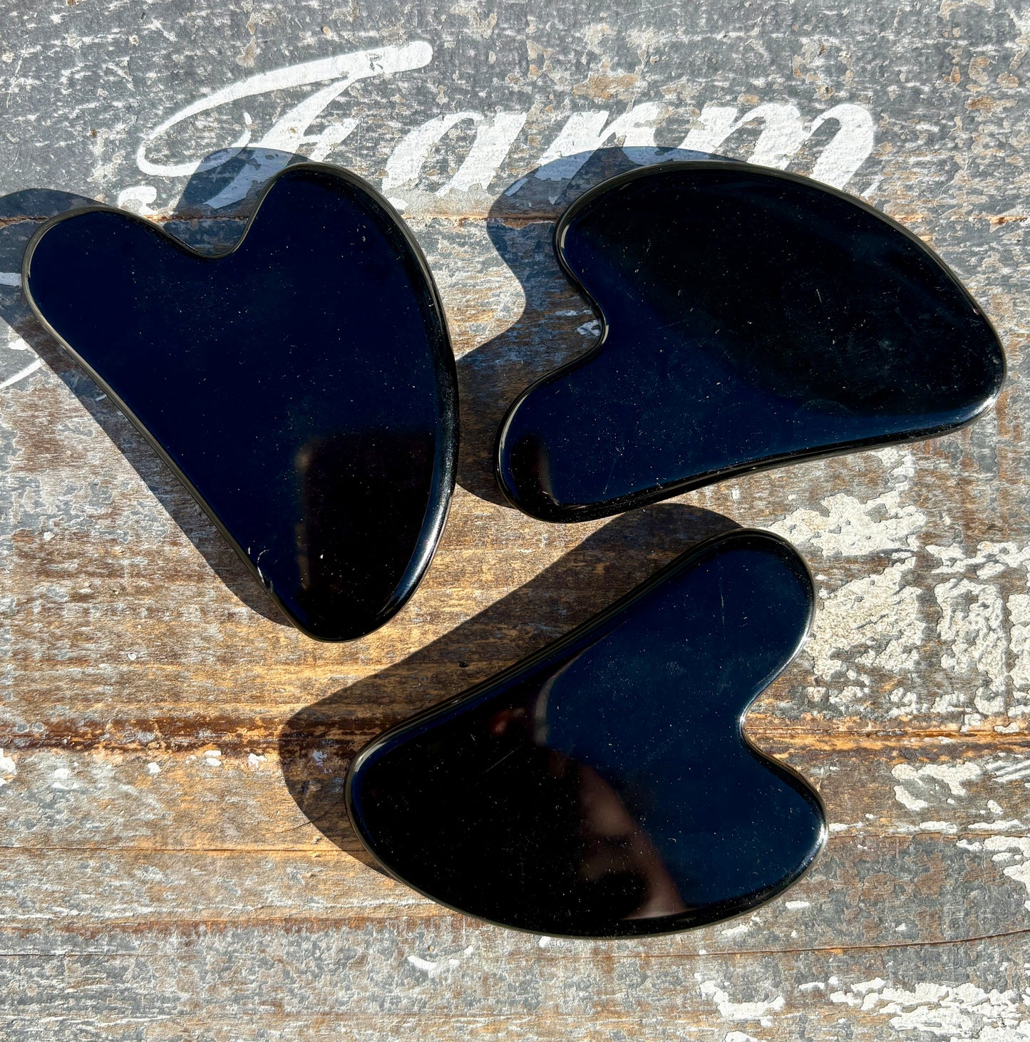 One (1) Obsidian Gua Sha Massage Tool