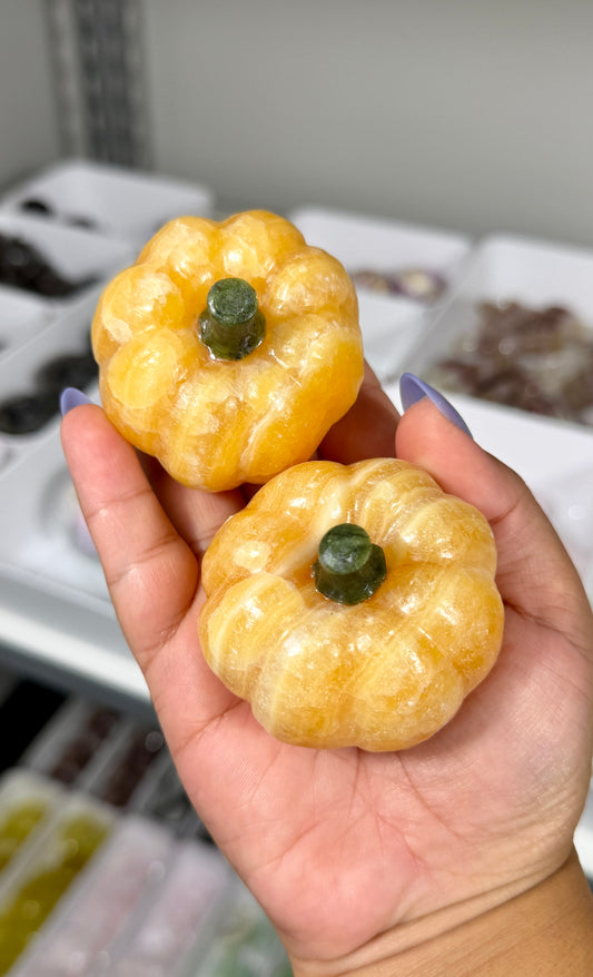 One (1) Orange Calcite Pumpkin (Serpentine Stem)