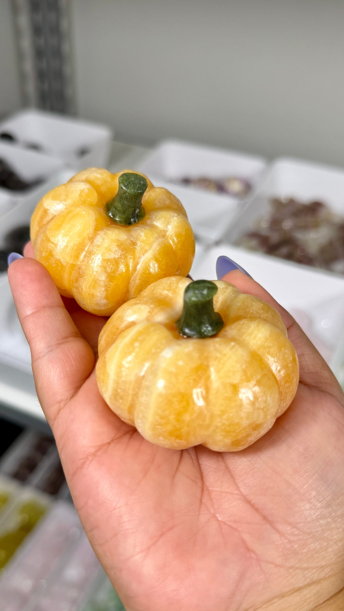 One (1) Orange Calcite Pumpkin (Serpentine Stem)