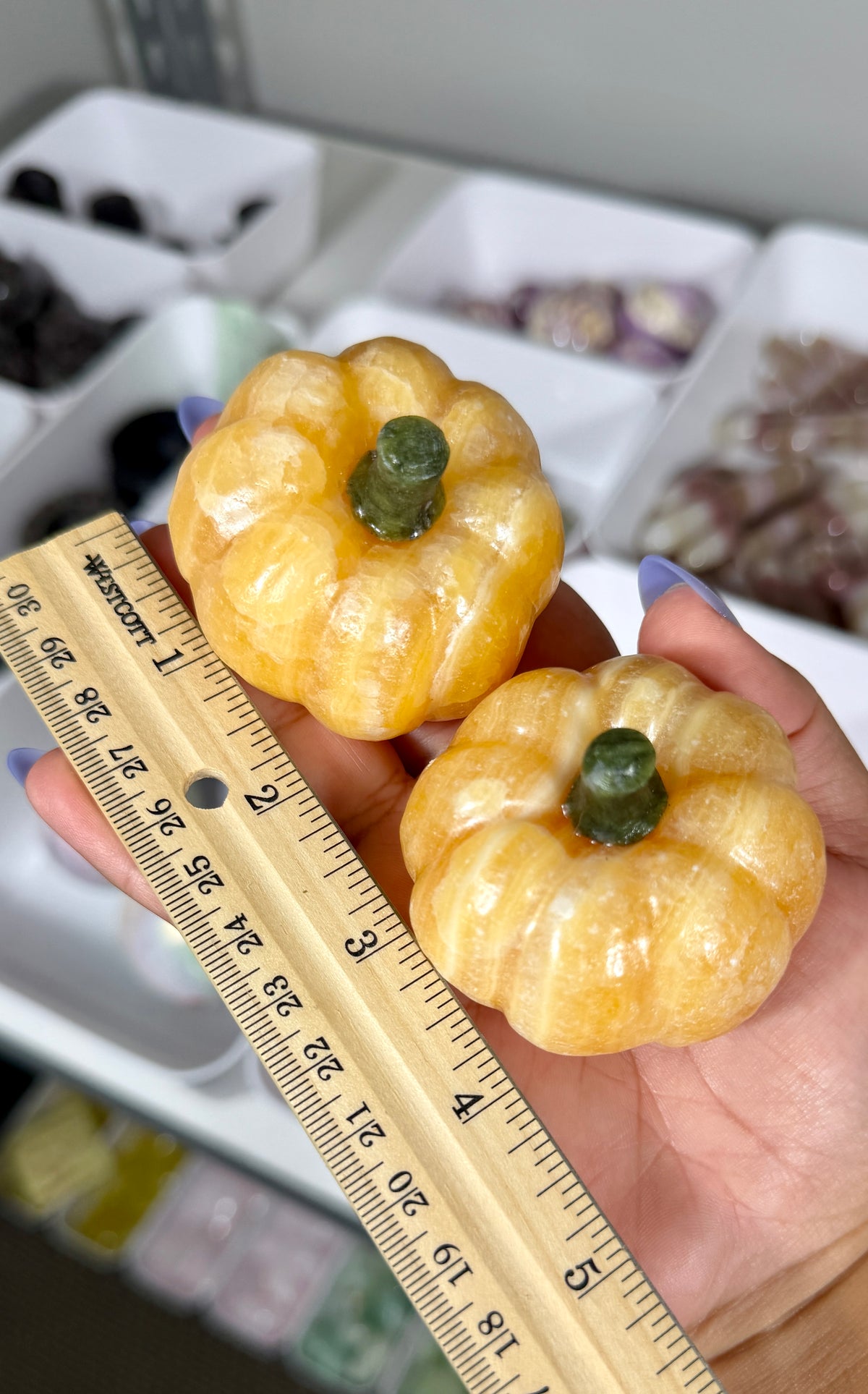 One (1) Orange Calcite Pumpkin (Serpentine Stem)
